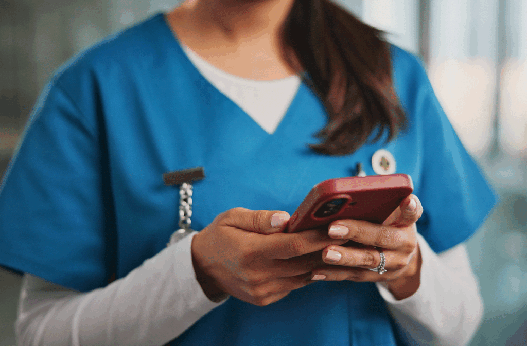 Nurse on smart phone using Banyan